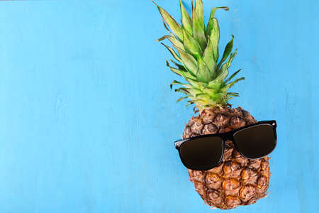 Ripe fresh pineapple in glasses. Travel conceptの写真素材