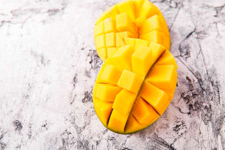 Ripe fresh mango close up. Food ingredients. Concept of healthの写真素材