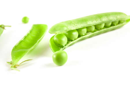 Fresh green pea isolated on white background. Food ingredientsの写真素材