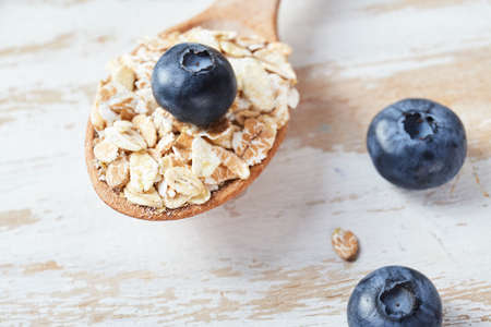 oatmeal porridge with blueberries. Health breakfast. Fresh fruits
