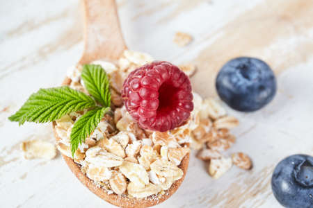 oatmeal porridge with raspberry and blueberry. health breakfast. Fresh fruits