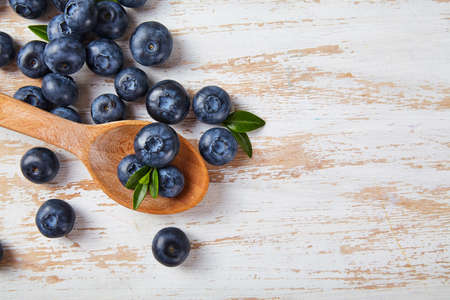 Blue berry close up on wood desk. Food ingredients. Fresh fruitの写真素材