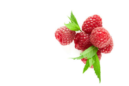 Raspberry with leaves isolated on white background. Fresh fruits. Sweet foodの写真素材