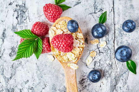 oatmeal porridge with raspberry and blueberry. health breakfast. Fresh fruitsの写真素材