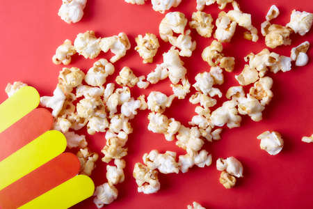 Sweet fried popcorn close up on color background. Food ingredientsの写真素材