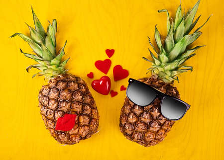 Fresh pineapple close up on wood desk with place for textの写真素材