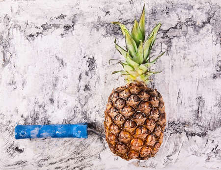 Fresh pineapple close up on wood desk with place for text