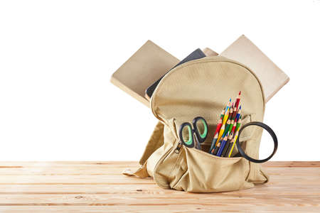 School briefcase with office supplies. Back to school concept