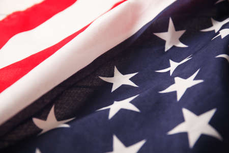 American flag close up on wood desk. Memorial dayの写真素材