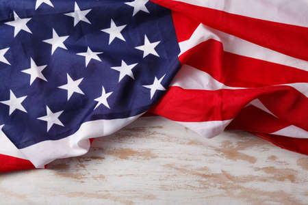 American flag close up on wood desk. Memorial day