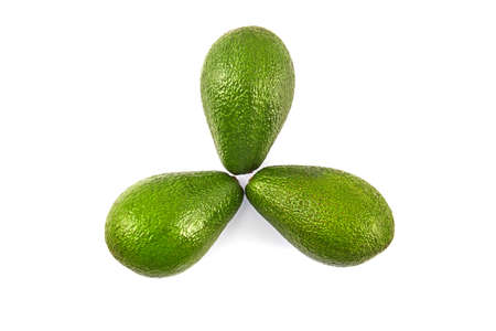 Fresh green avocado isolated on white background. Food ingredients. Vegan concept