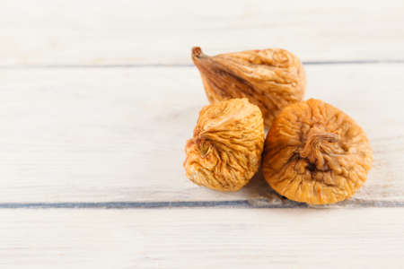 Dry fig close up on wood desk. Food ingredients. Healthの写真素材