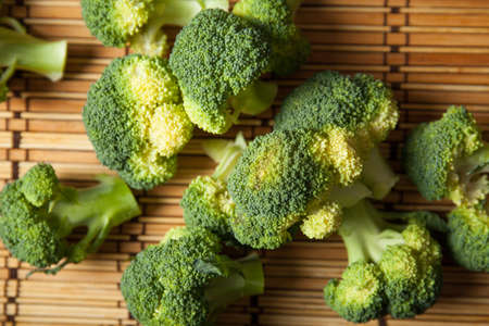 Healthy Green Organic Raw Broccoli Florets Ready for Cookingの写真素材