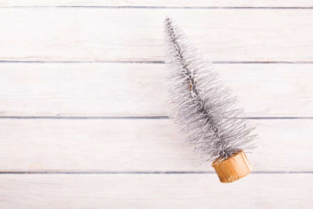 Christmas fir tree with decoration on dark wooden boardの写真素材