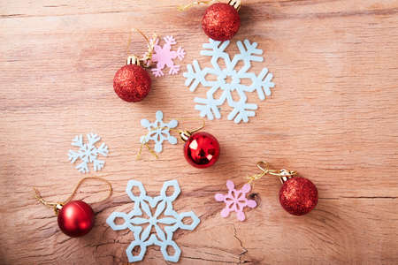 Red christmas ball on wood desk. Happy new yearの写真素材