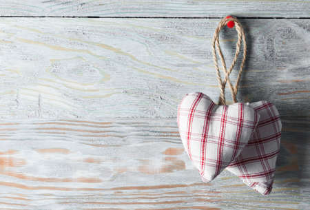 Heart on wood desk. Valentines day backgroundの写真素材