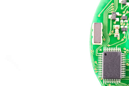 Printed Circuit Board with many electrical components on white background