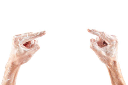 Closeup of male hand with soap pointing. Isolated on white background