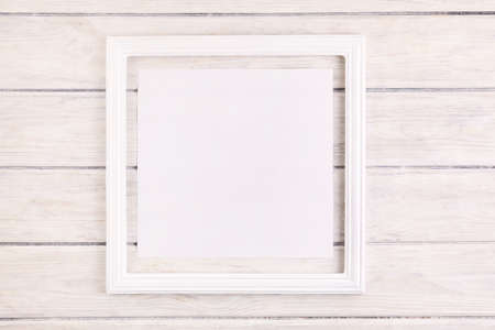 Creative layout made of tropical leaves with vintage frame. Flat lay. Nature conceptの写真素材