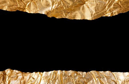 Gold silver glitter background, shiny wrapping paper defocusの写真素材