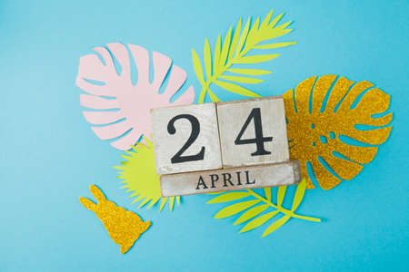 Calendar cube with date 24 april. Easter backgroundの写真素材