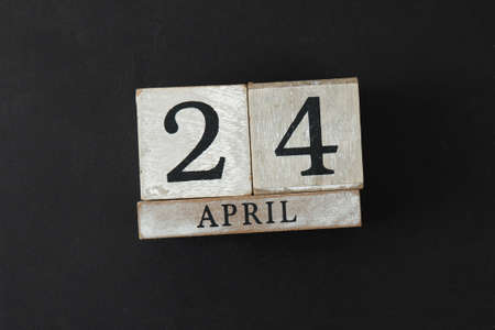 Calendar cube with date 24 april. Easter backgroundの写真素材