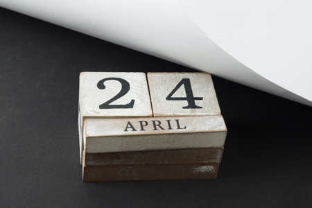 Calendar cube with date 24 april. Easter backgroundの写真素材
