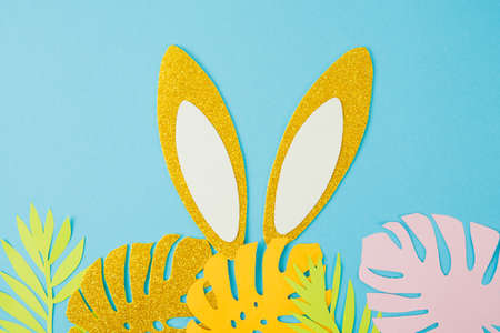 Creative paper rabbit on color background. Easter layoutの写真素材