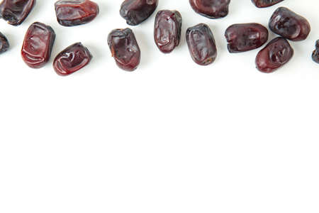 Pattern of Dates on white background. Creative food layoutの写真素材