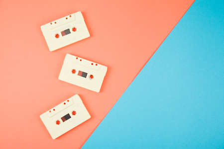 retro white audio cassette tape on color background. Creative layout.の写真素材
