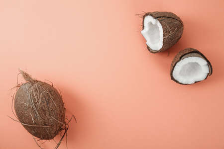 Fresh coconut on coral background. Food ingredients. Health food