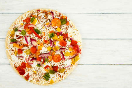 Fresh pizza close up. Food ingredients. Template servingの写真素材
