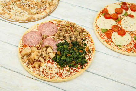 Fresh pizza close up. Food ingredients. Template serving