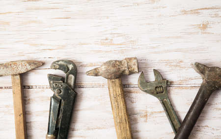 construction tools on wooden background with space for copy. Hammer, screwdriver, wrenchの写真素材