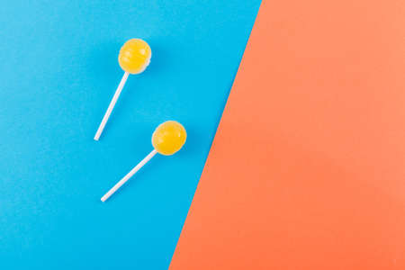 lolipop on mint blue pastel background.sweet candy conceptの写真素材