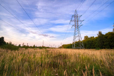 Power line supports at the beautiful sky background. Power supply conceptの写真素材