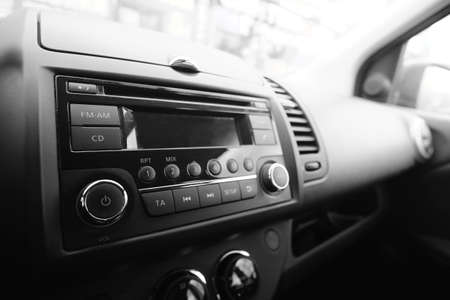 Multimedia system in car. Black and white photo of car interior.の写真素材