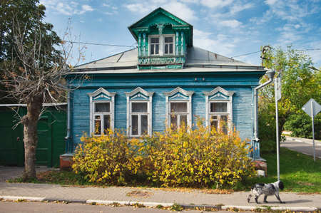Vintage rural wooden house with ornamental carved windows, frames in Kolomna, Moscow region, Russia.のeditorial素材