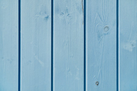 Wooden planks background painted in blue color. Soft light blue wooden texture.の写真素材
