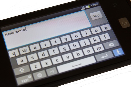 mobile phone with the words Hello World の写真素材