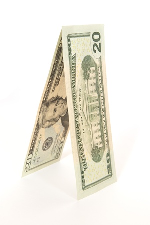 Tent of twenty dollar bills isolated on white backgroundの写真素材