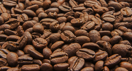 Roasted coffee beans closeup backgroundの写真素材