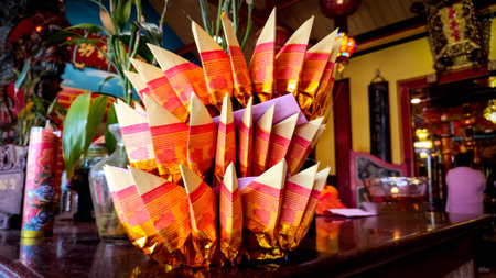 a group of folded paper on a table