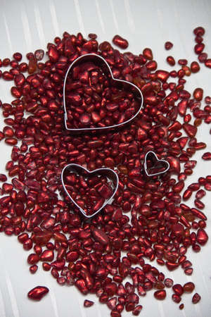  Red decorative stones with three hearts.の写真素材