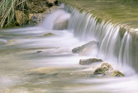 Waterfall and rock