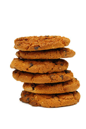 stack of chocolate chip cookies isolated on white backgroundの写真素材