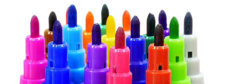 closeup on set of standing vertical colorful felt pens on white background, suitable for header or...