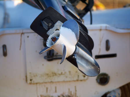closeup of boat motor screw
