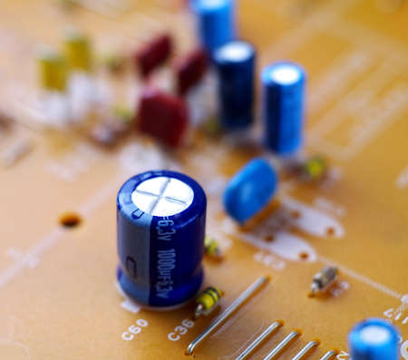 electrolytic capacitor on printed circuit board, macro, selective focusの写真素材