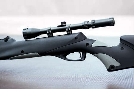 closeup of air rifle with telescopic sightの写真素材